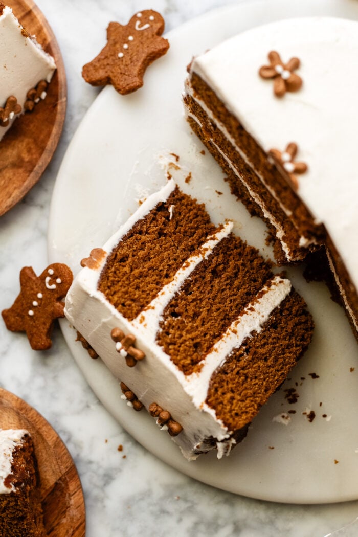 slice of vegan gingerbread cake on marble cake plate