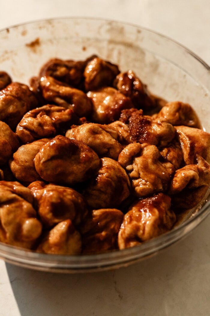 monkey bread bites being coated