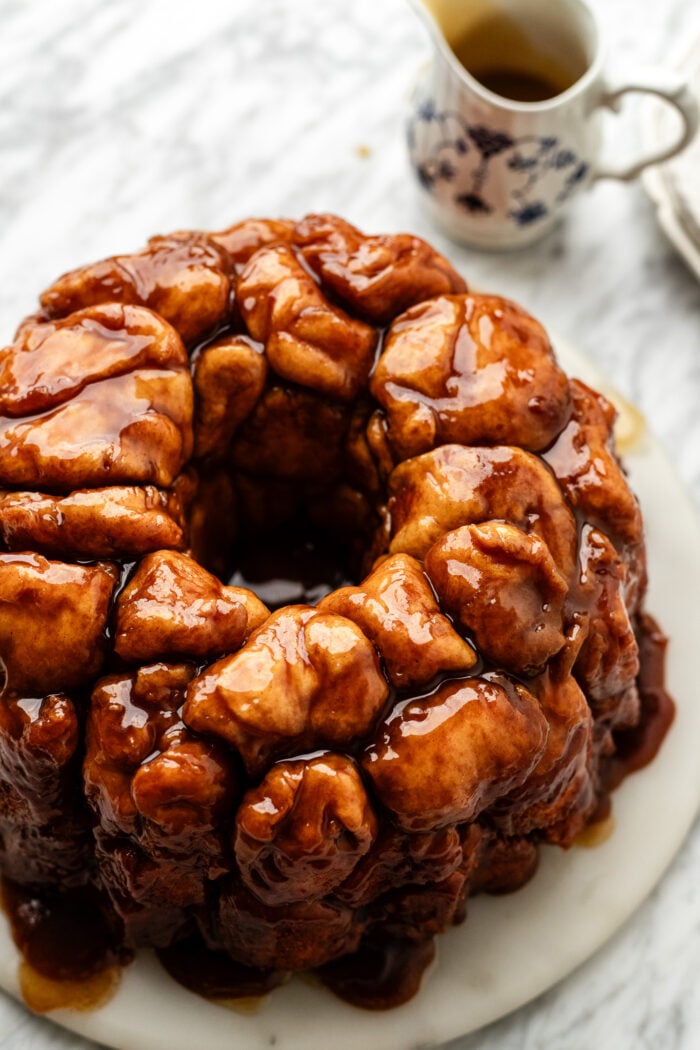 baked vegan monkey bread being served on a marble platter