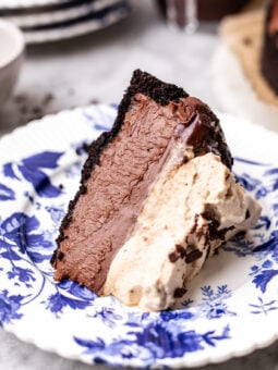 slice of vegan no bake chocolate cheesecake on a plate