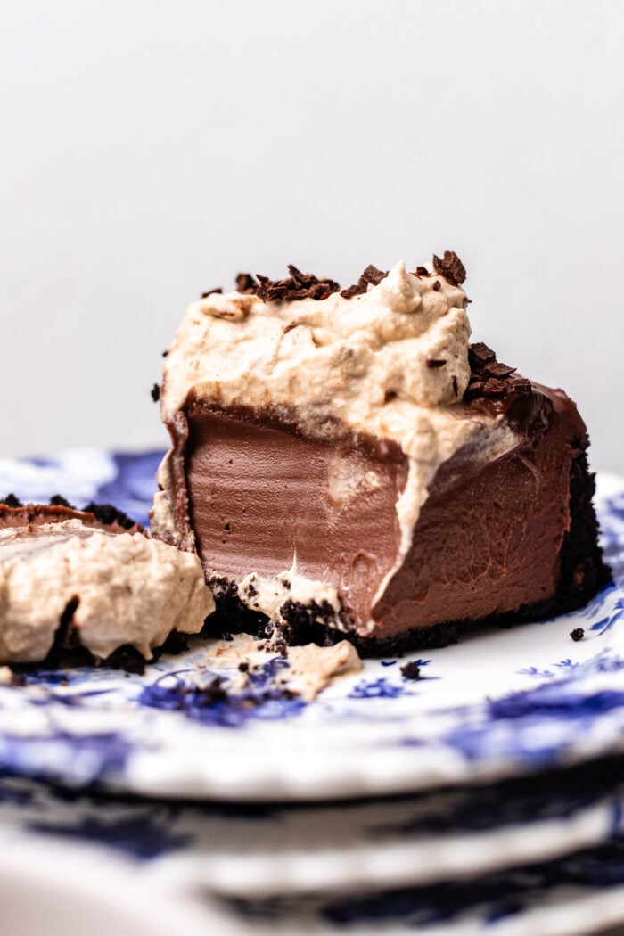 bitten slice of vegan chocolate cheesecake