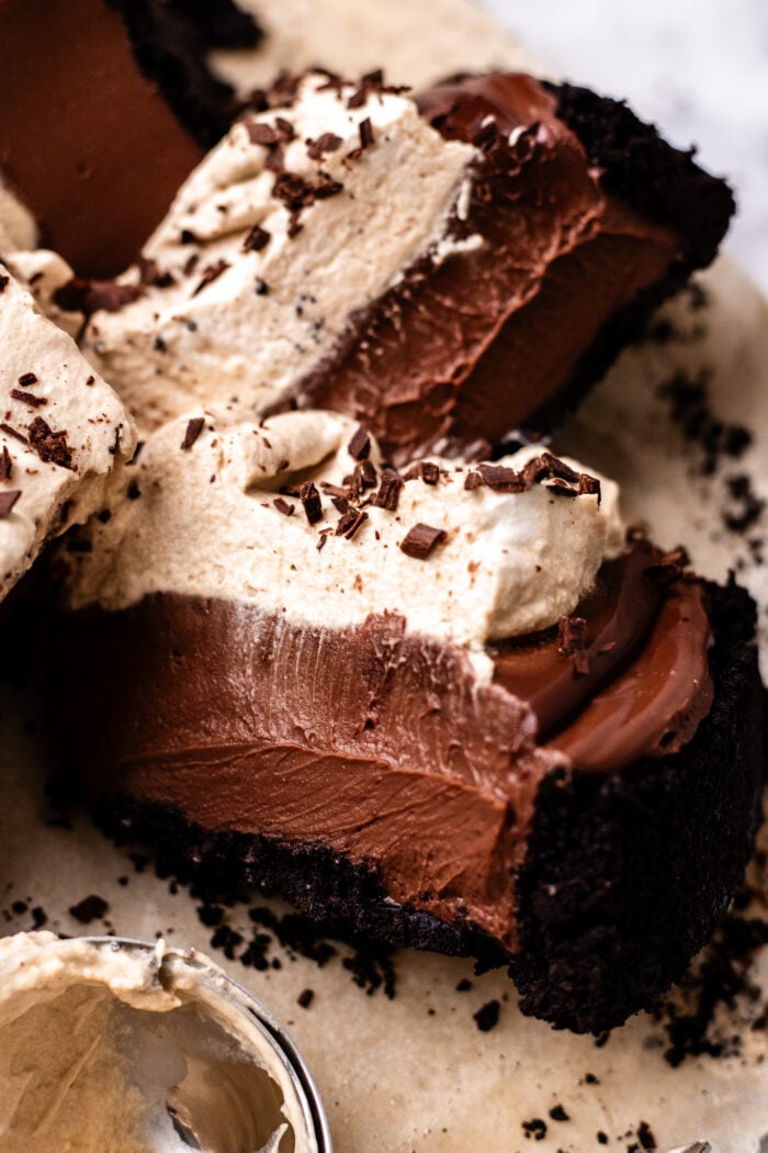 sliced vegan no bake chocolate cheesecake slices