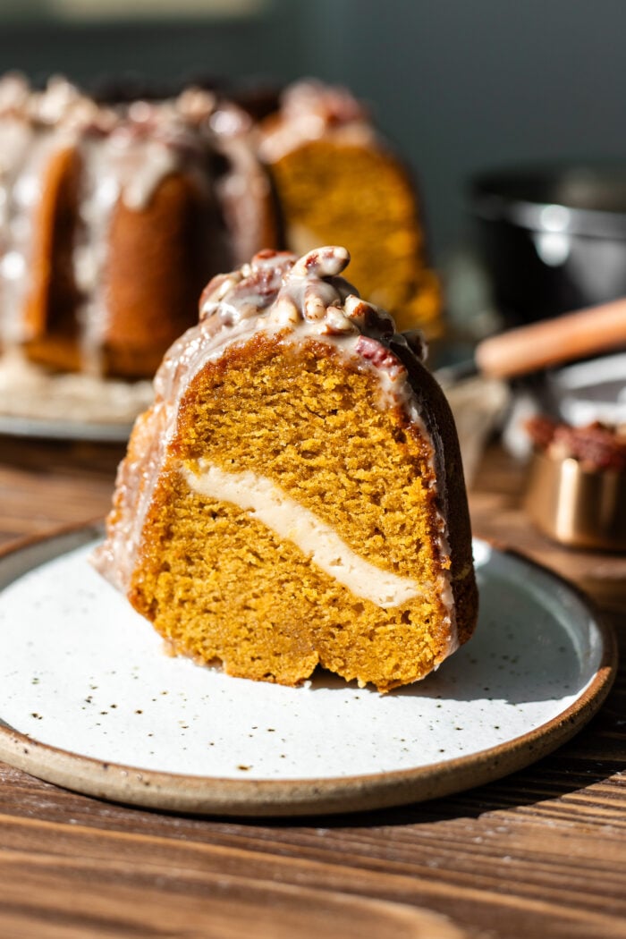 slice of pumpkin bundt cake on a plate