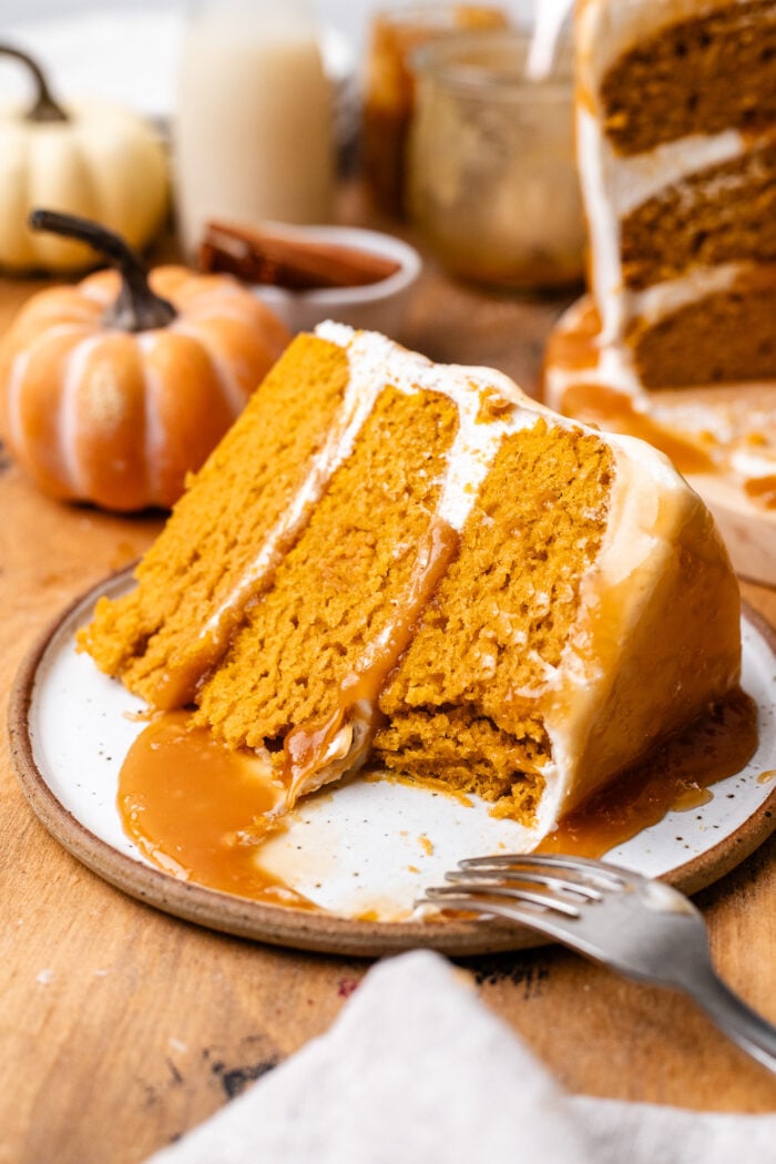 bitten slice of vegan pumpkin cake