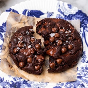 broken in half chocolate chip cookie on a plate