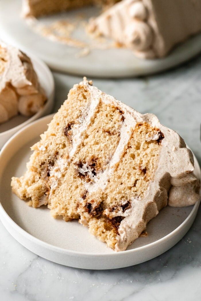 slice of vegan snickerdoodle cake on a plate