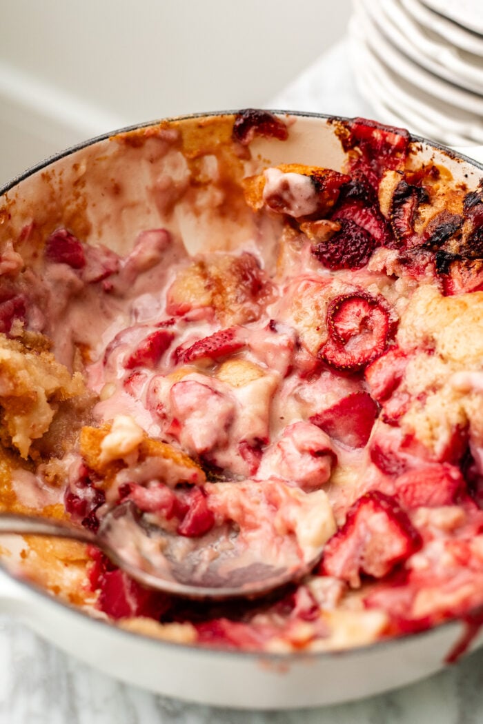 scooping the strawberry cobbler