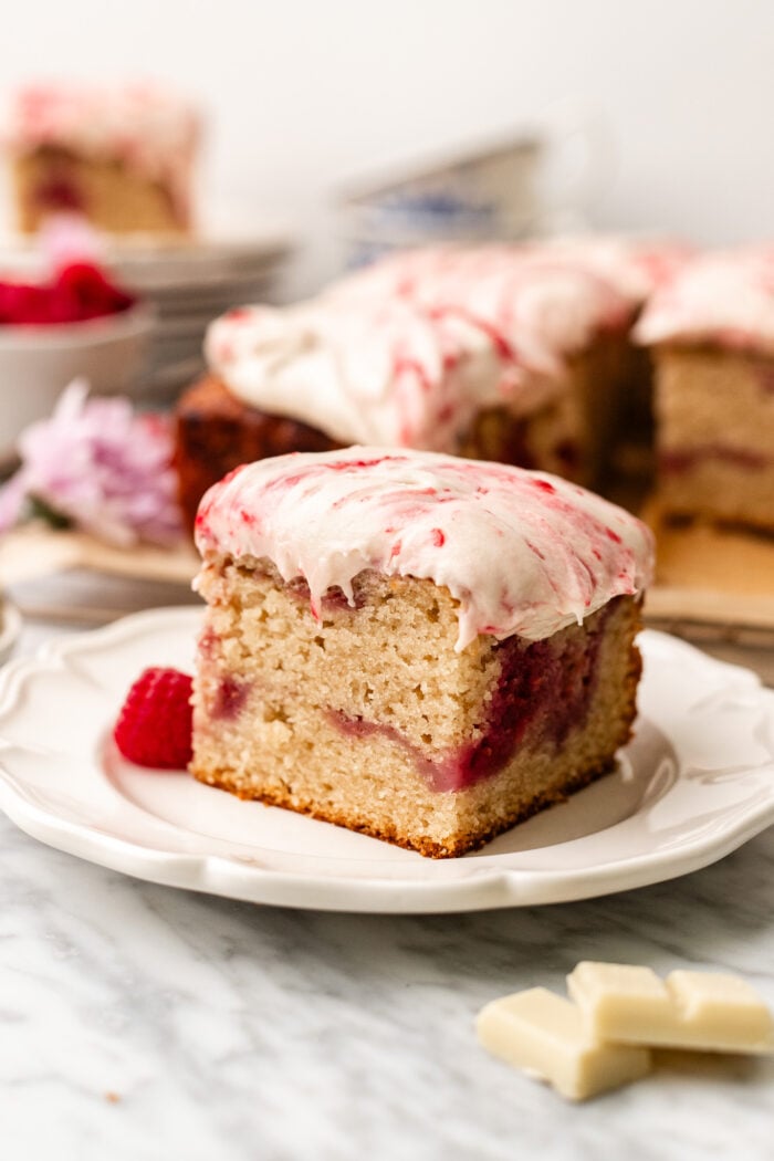 slice of raspberry white chocolate cake on a plate