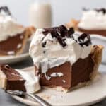 slice of vegan chocolate cream pie on a plate
