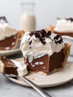 slice of vegan chocolate cream pie on a plate