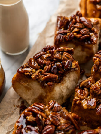 Maple Vegan Sticky Buns on parchment paper