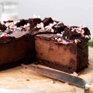 sliced vegan chocolate peppermint brownie cheesecake