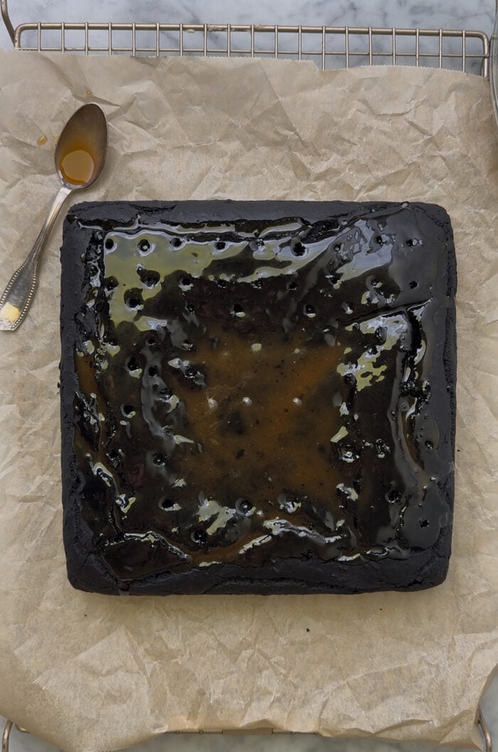 cake after baking and soaking in toffee sauce